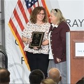 Mayor Moore presenting the Employee of the Year to Kelly Churney 